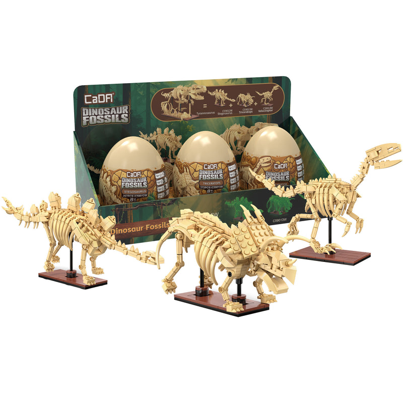 Tray of 3 Dinosaur Eggs with Stegosaurus Triceratops & Velociraptor